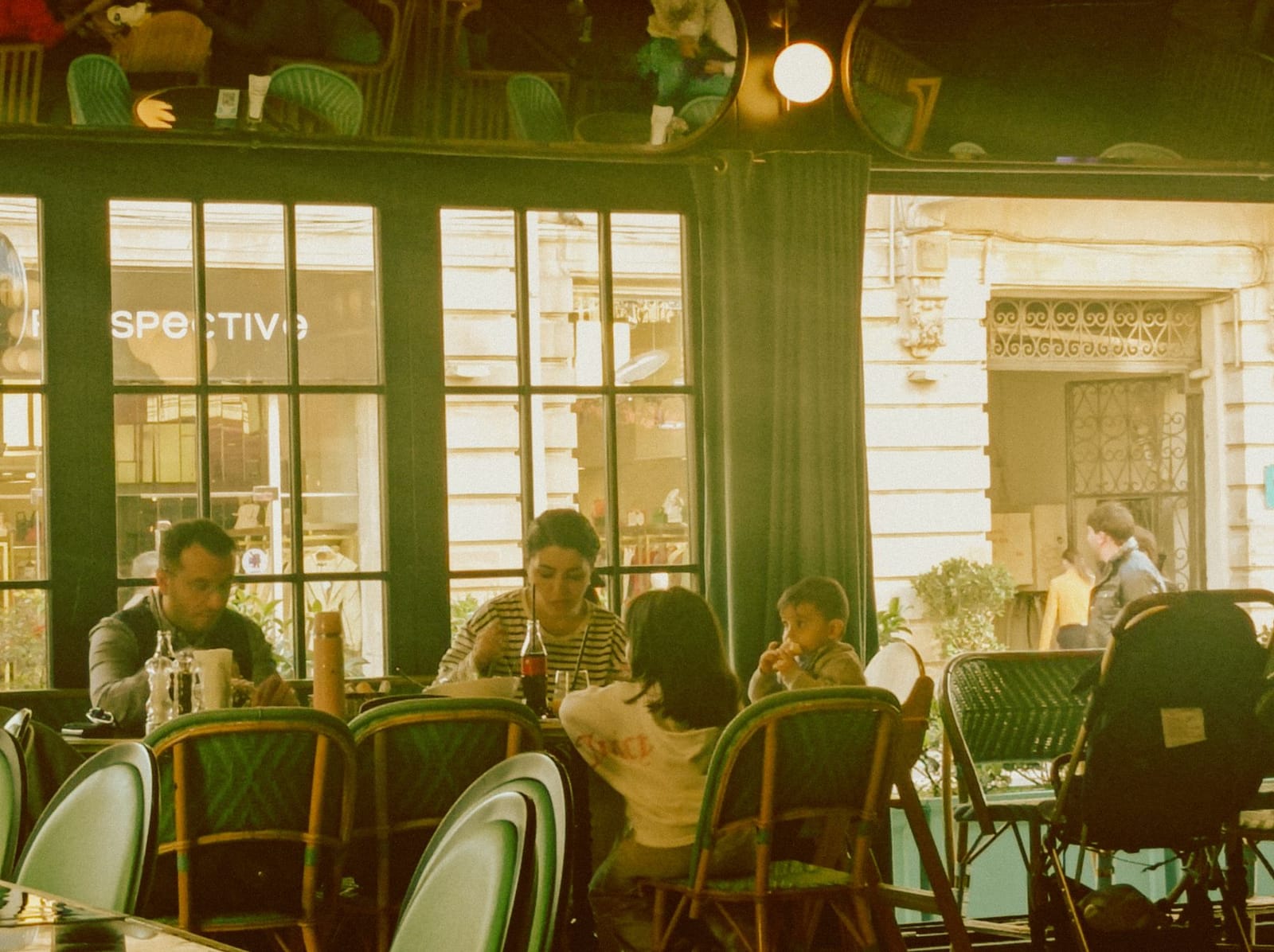Placeholder photograph of a family enjoying a restaurant meal